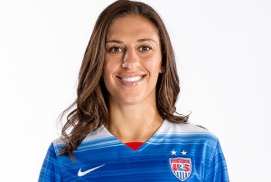 A very happy Carli Lloyd, who will spend the next three years installing carpets in strangers homes. 